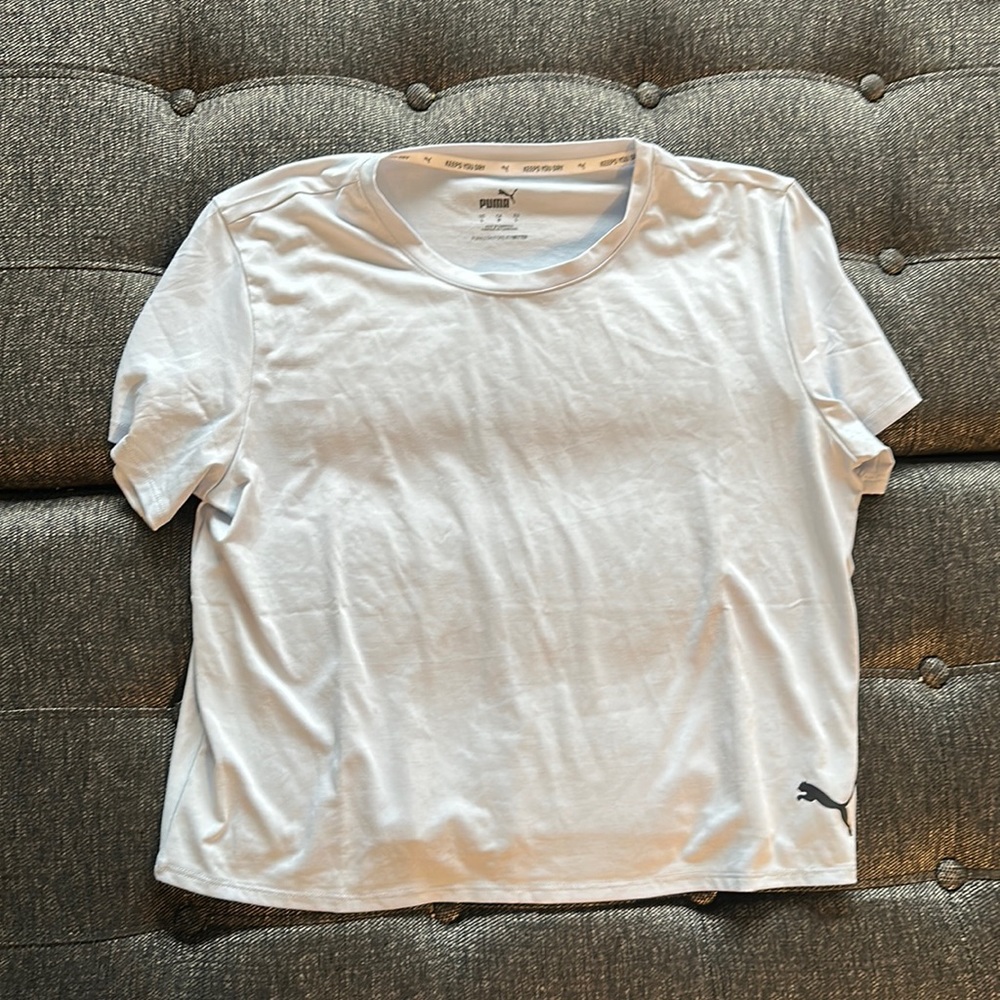 Puma women’s workout Tee. Color light blue. Size Large.
